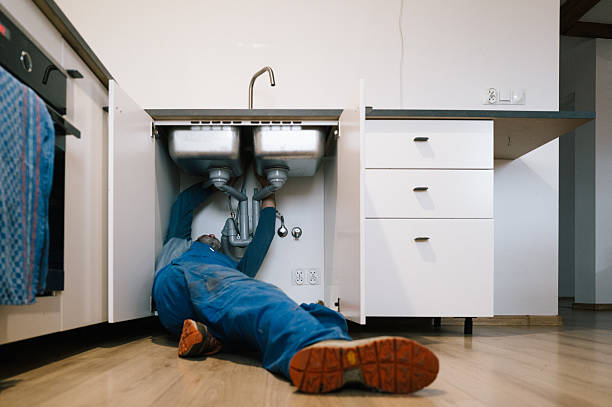 Professional Drain Cleaning technician working in Dedham, MA